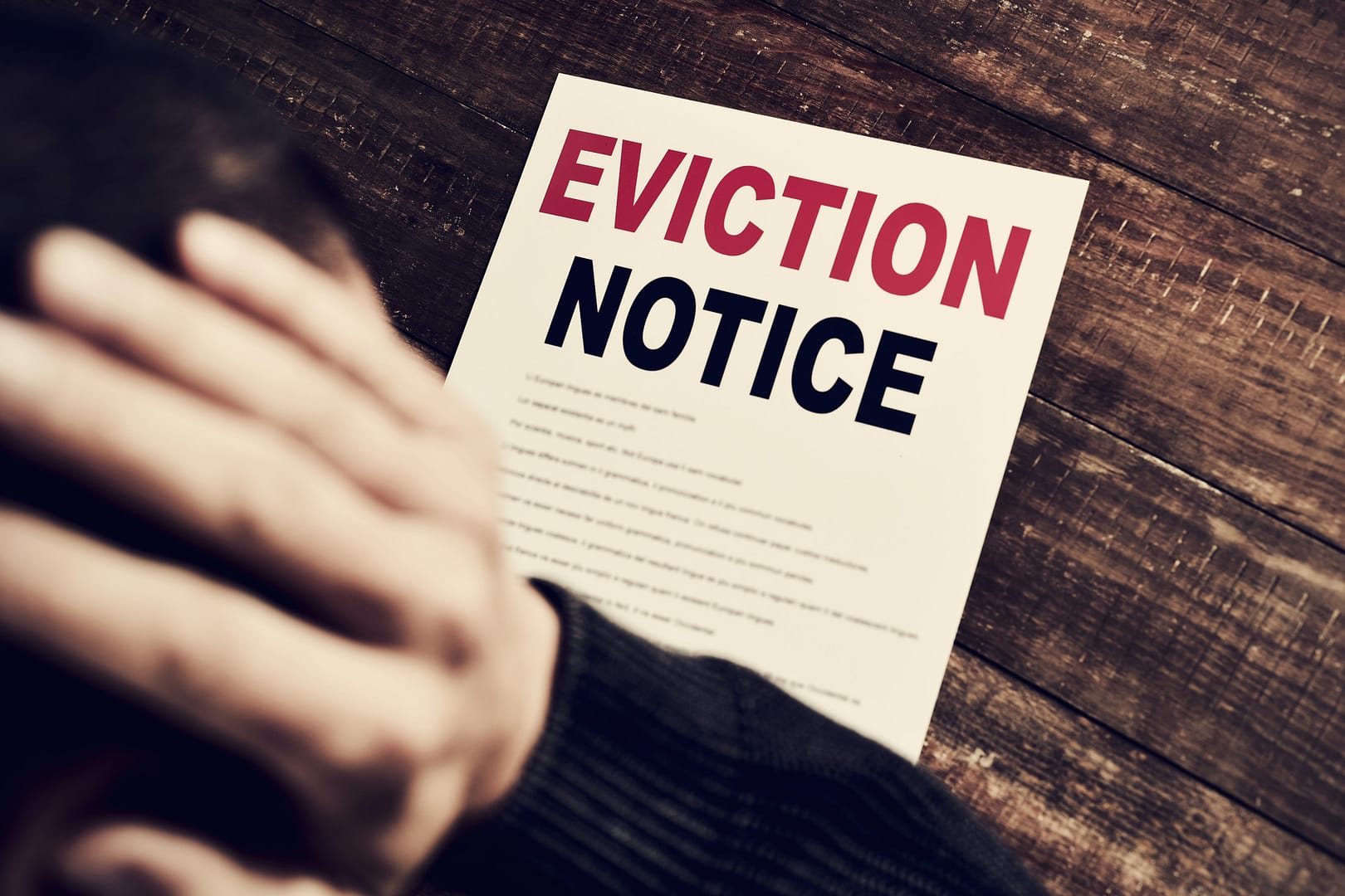 young man who has received an eviction notice