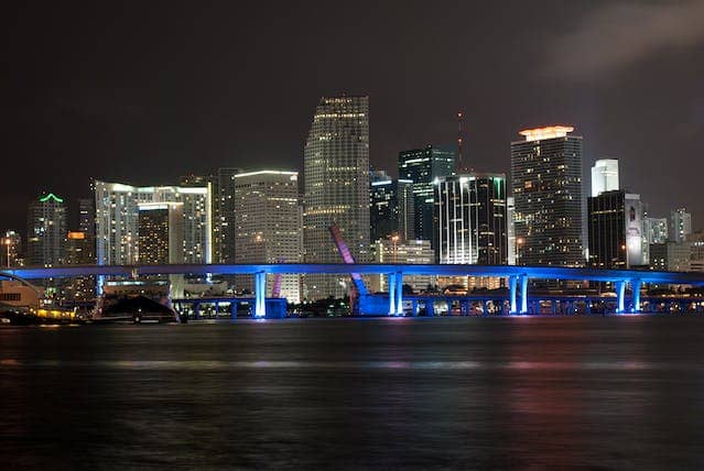 the Miami water-front skyline at night